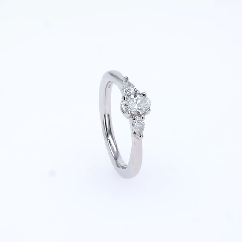 Oval and Pearshaped Three Stone Diamond Ring 0.31ct in Platinum