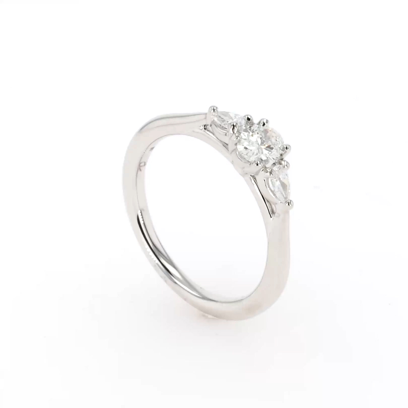 Oval and Pearshaped Three Stone Diamond Ring 0.50ct in Platinum