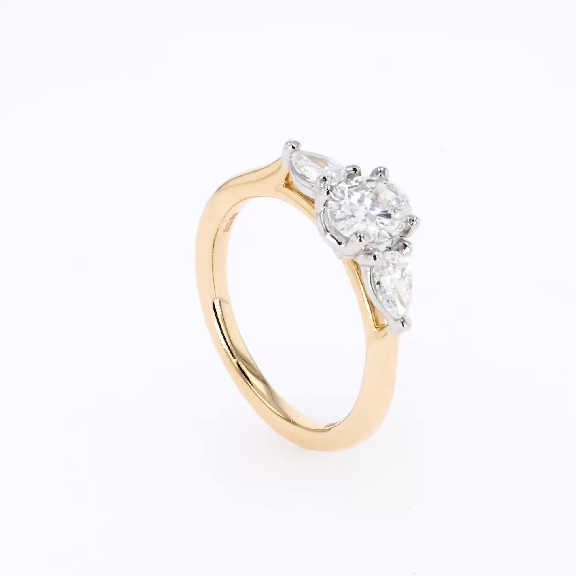 Oval and Pearshaped Three Stone Diamond Ring 1.11ct in Platinum