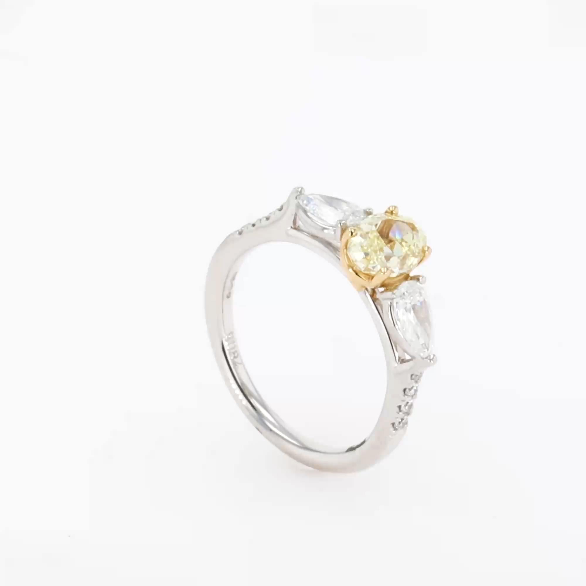 Oval Cut 1.03ct Fancy Light Yellow Diamond Three Stone Ring in Platinum and 18ct Yellow Gold