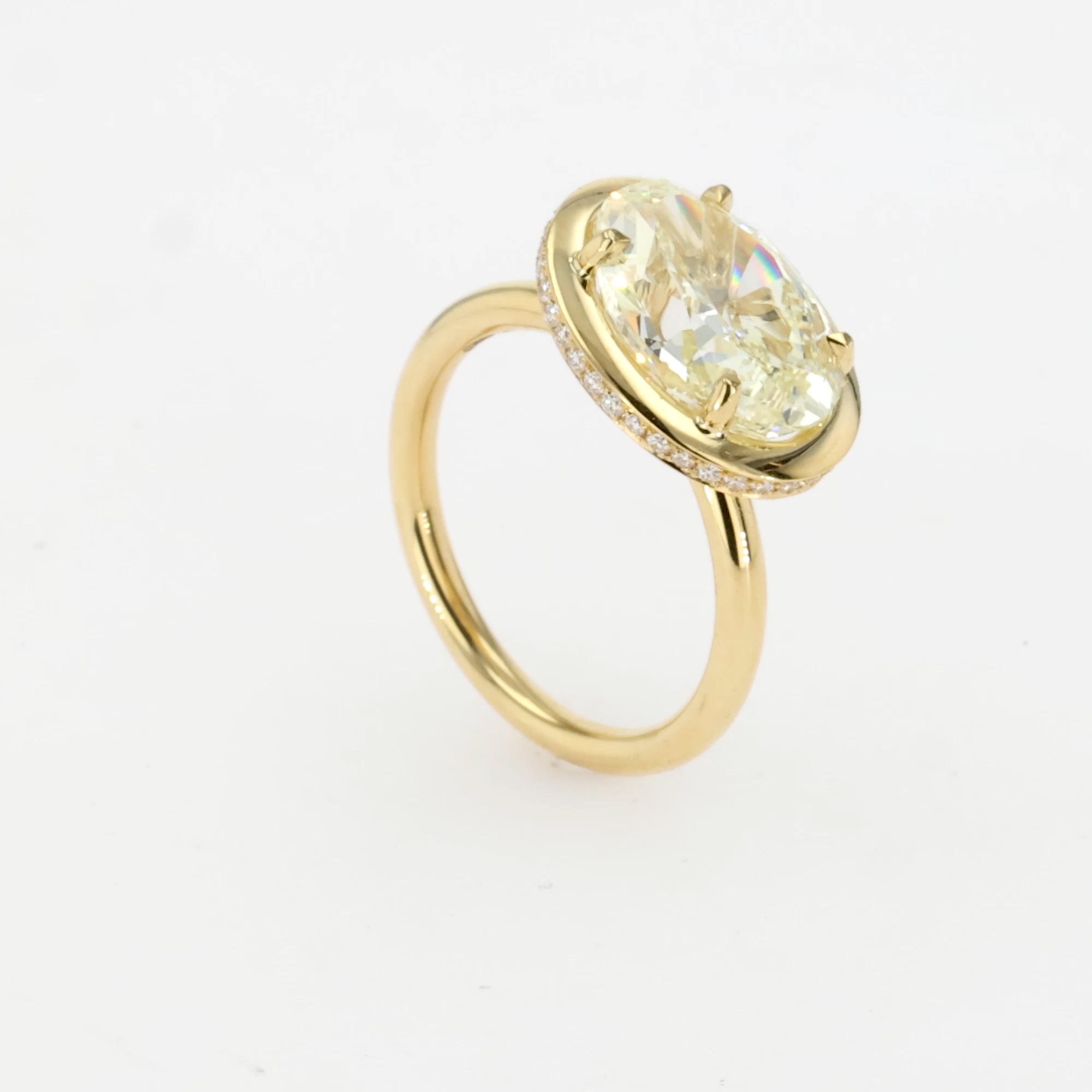 Skimming Stone Oval Cut 5.04ct Diamond Ring in 18ct Yellow Gold