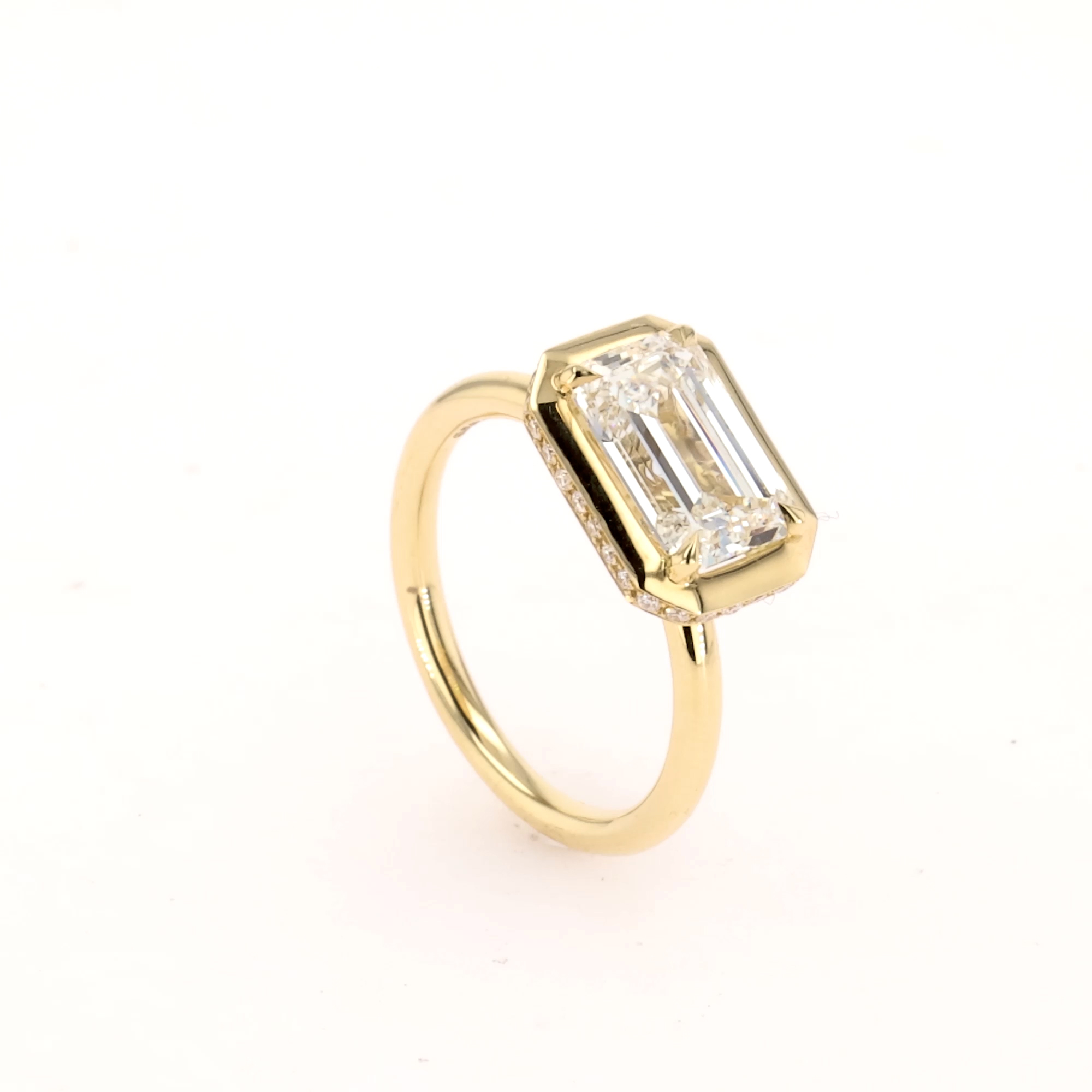 Skimming Stone Emerald Cut 2.75ct Diamond Ring in 18ct Yellow Gold