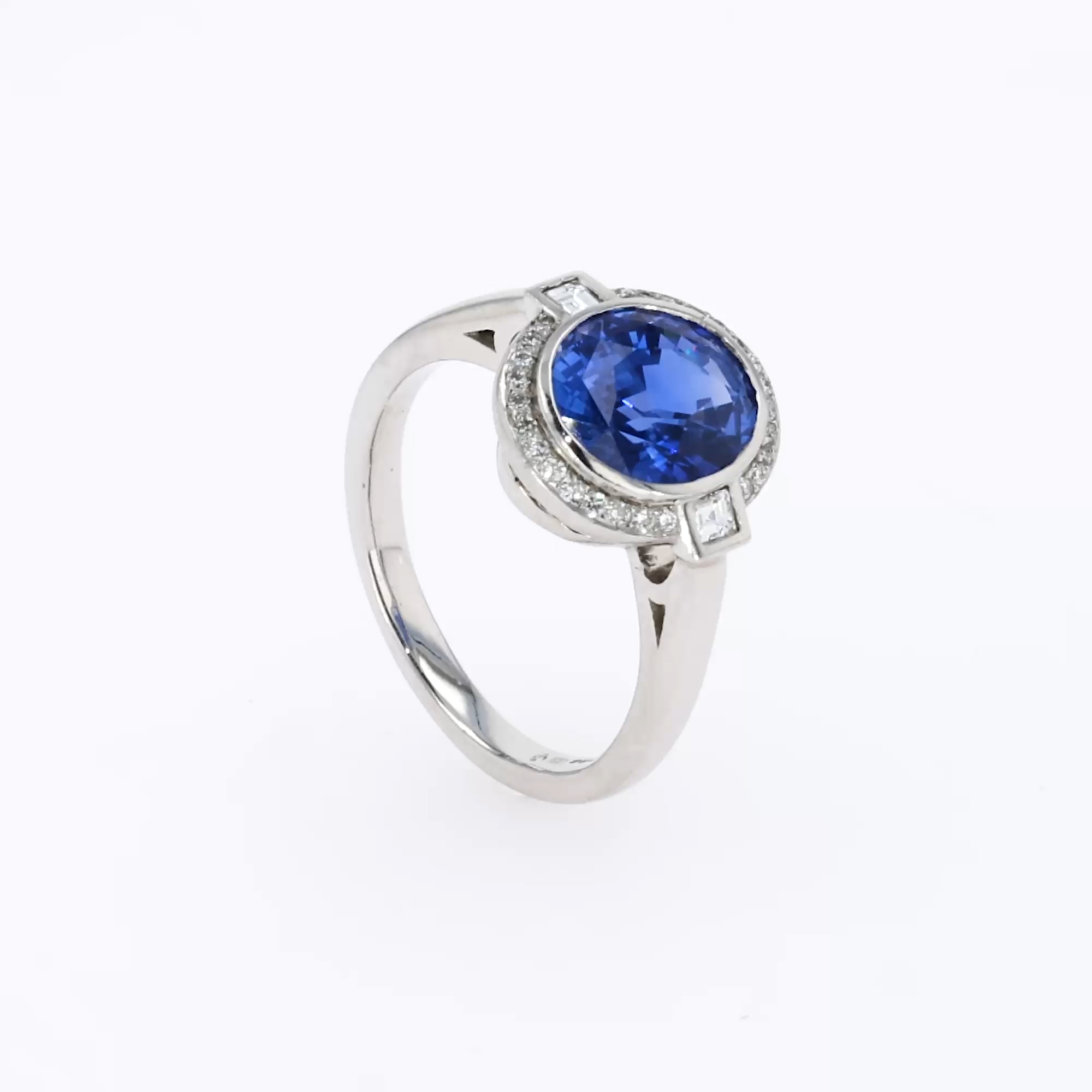 Oval Cut 4.09ct Sapphire and Diamond Cluster Ring in Platinum