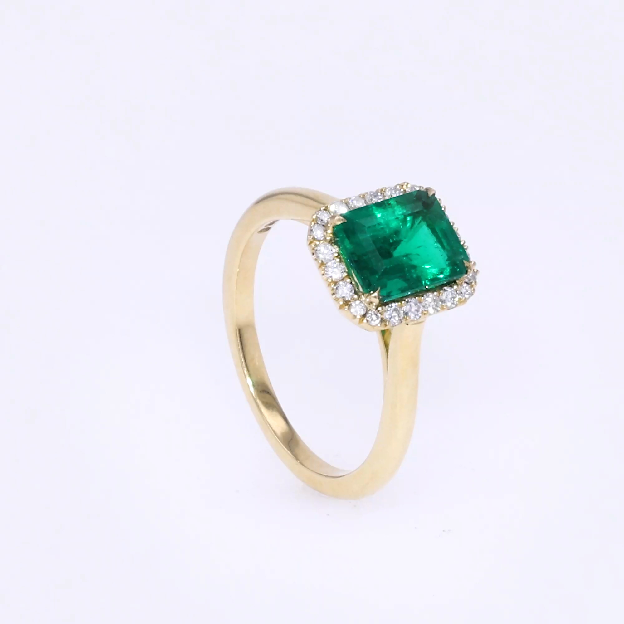 Emerald Cut 1.63ct Colombian Emerald and Diamond Cluster Ring in 18ct Yellow Gold
