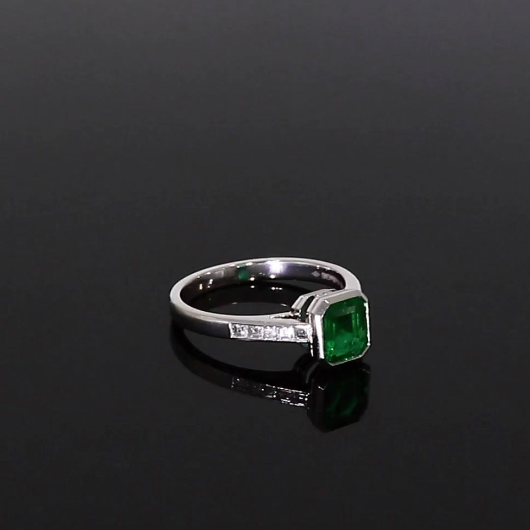 Trap Cut 0.77ct Emerald and Diamond Ring in Platinum