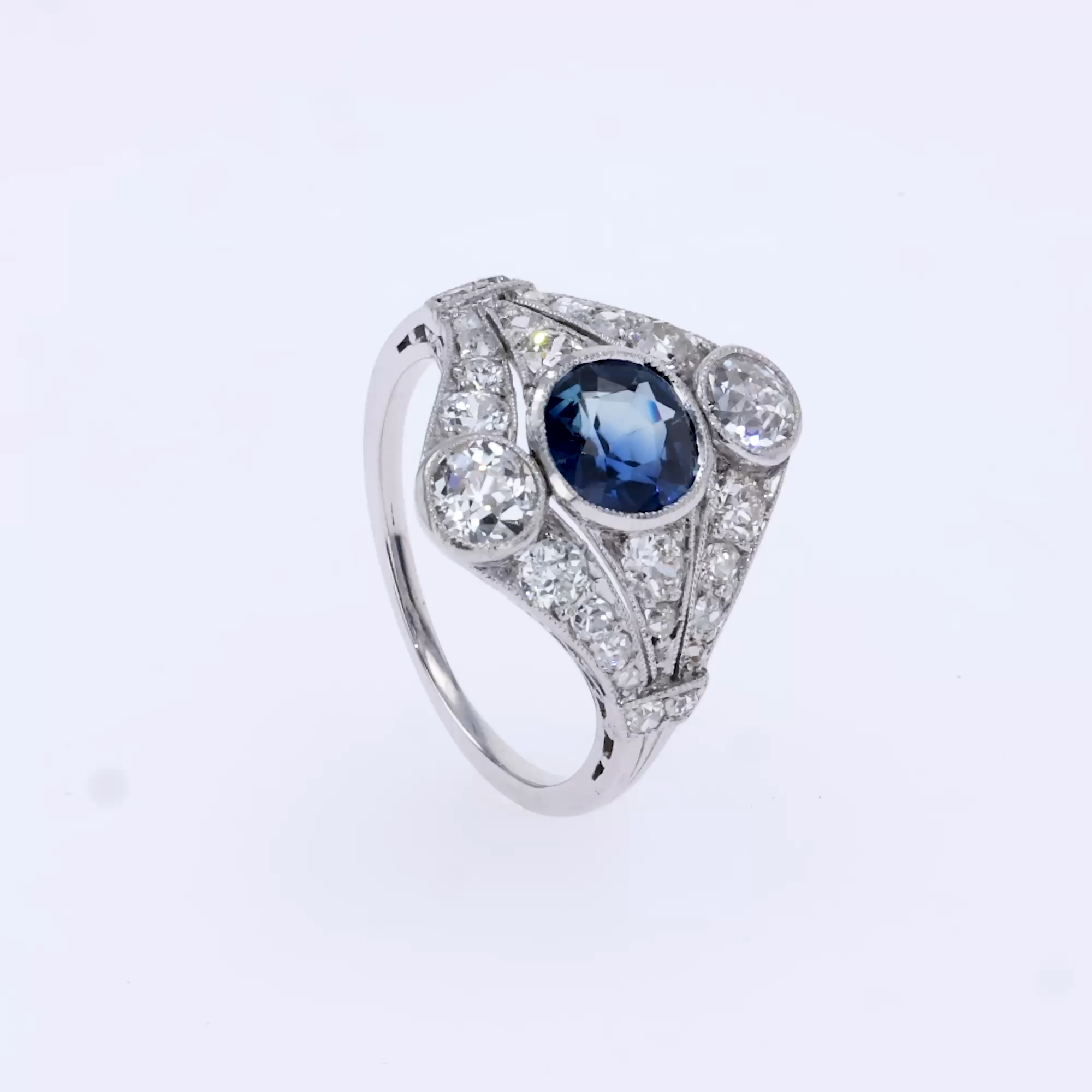 Antique Edwardian Sapphire and Diamond Cluster Ring in Platinum