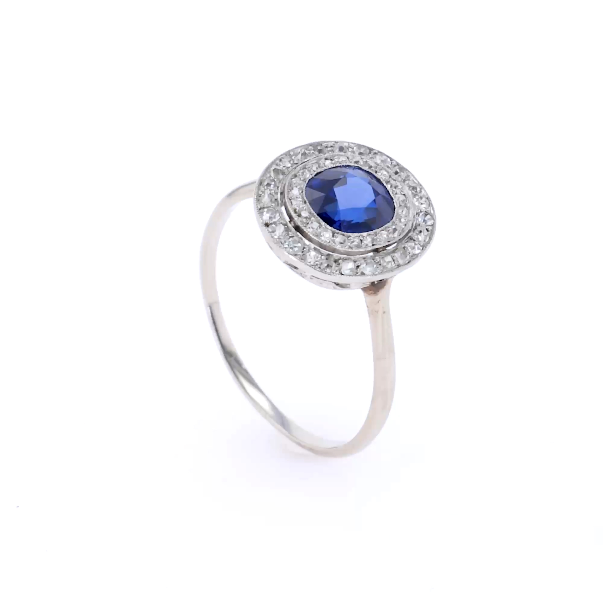 Oval Cut Sapphire and Diamond Target Ring in 18ct White Gold