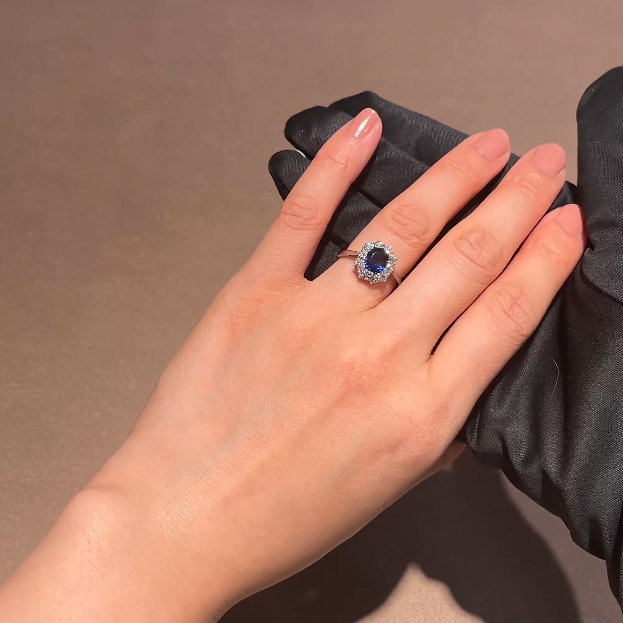 Oval Cut Sapphire and Diamond Cluster Ring in Platinum