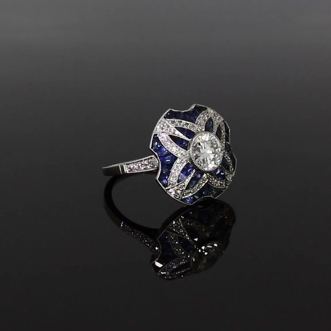 Art Deco Inspired Diamond and Calibre Sapphire Dress Ring with Sapphire and Diamond surround 1.08ct in Platinum