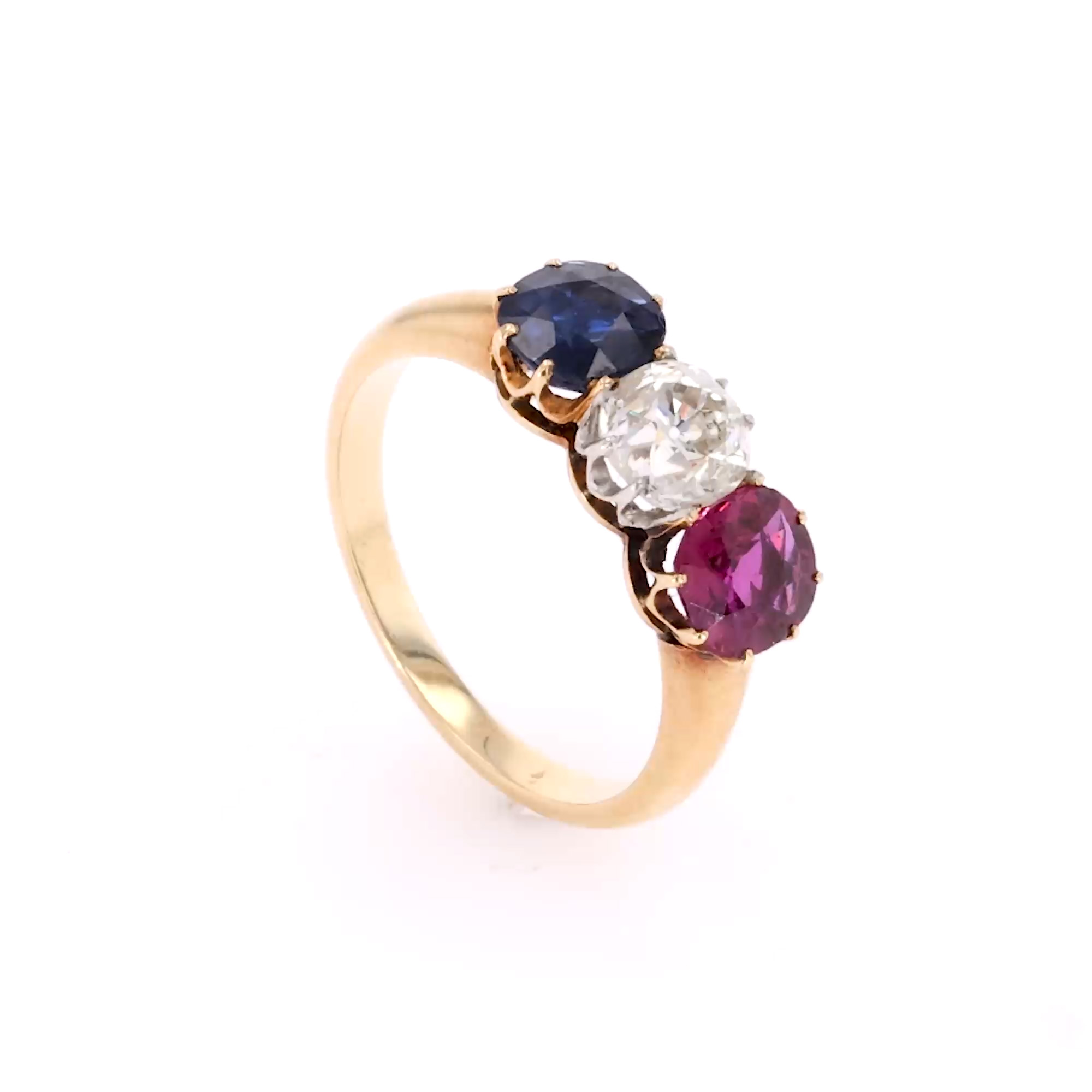Belle Époque Cushion Cut Diamond, Ruby and Sapphire Ring In 18ct Yellow Gold