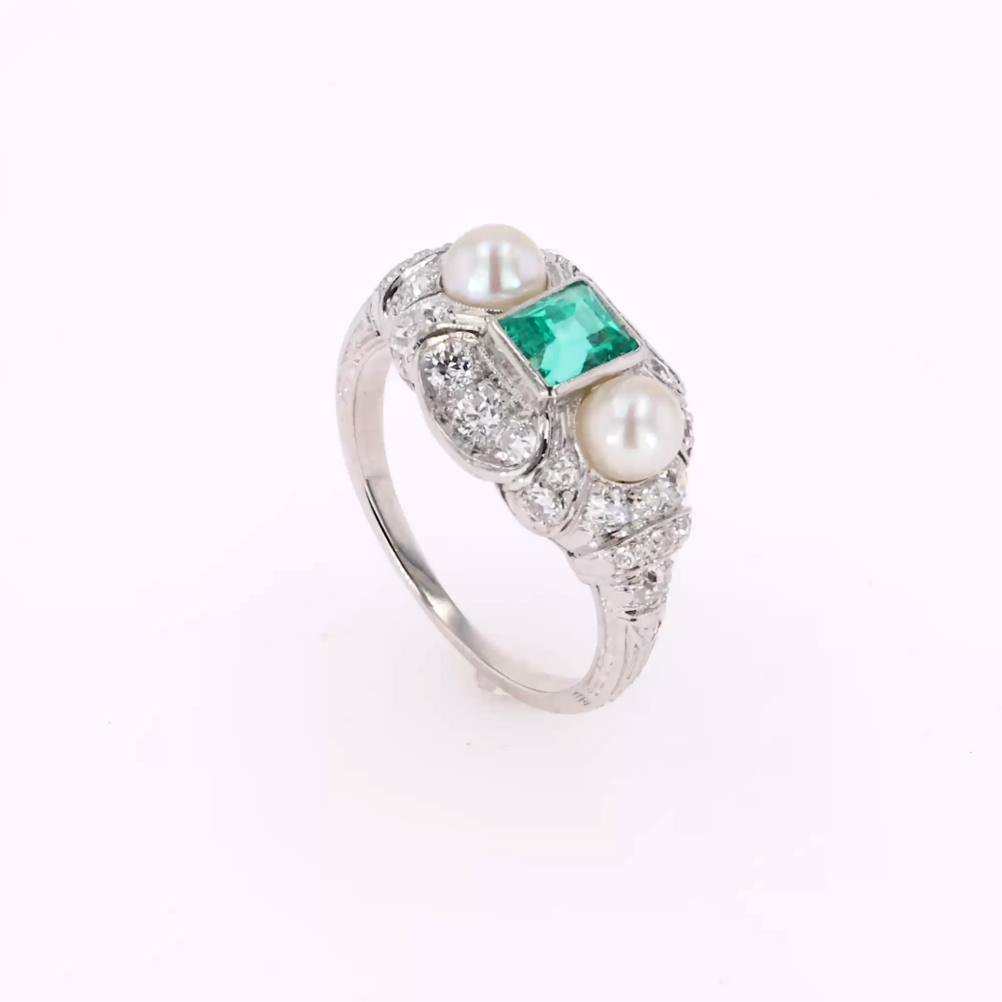 Edwardian 0.46ct Emerald Cut Emerald, Pearl and Diamond Ring in Platinum