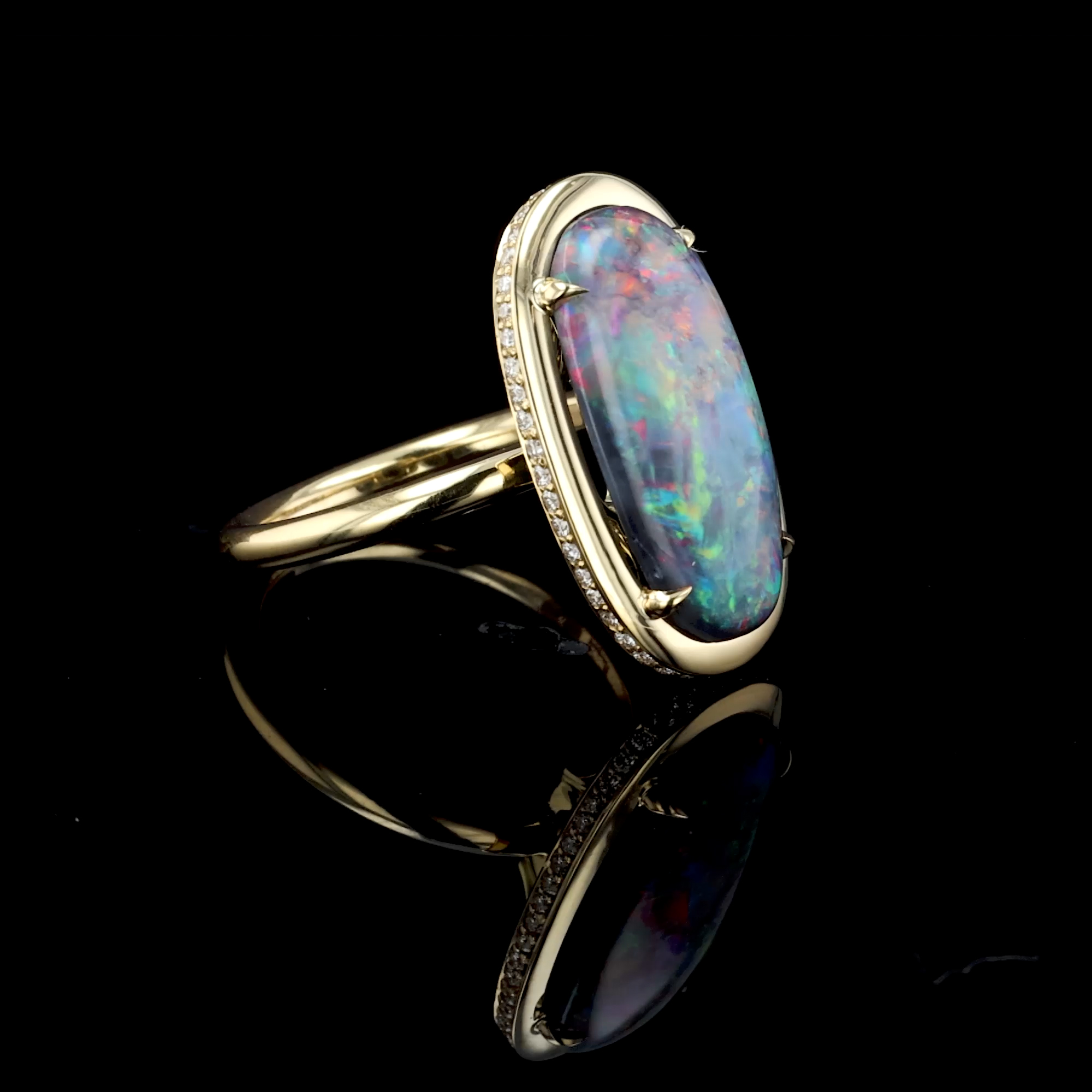 Skimming Stone Cabochon Cut 6.00ct Black Opal and Diamond Ring in 18ct Yellow Gold