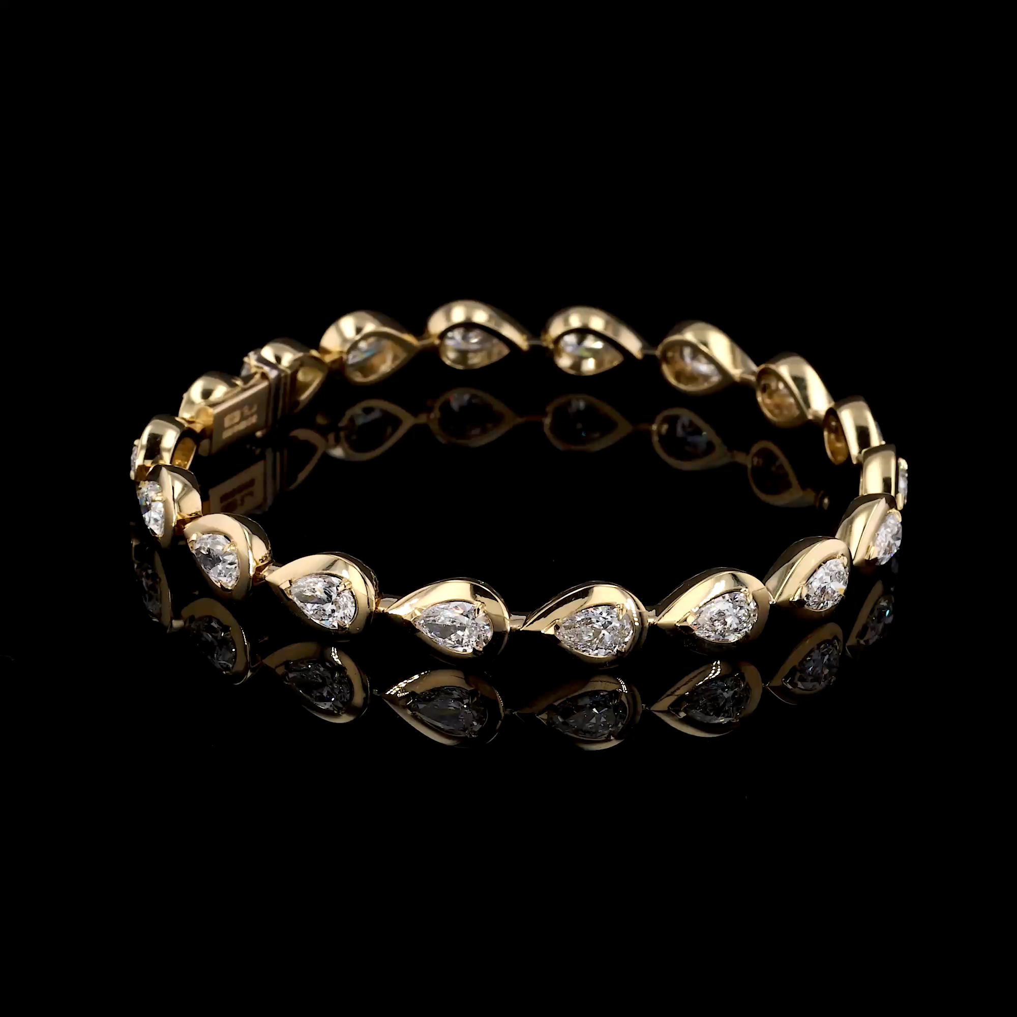 Skimming Stone Pear Shaped 5.70ct Diamond Line Bracelet in 18ct Yellow Gold