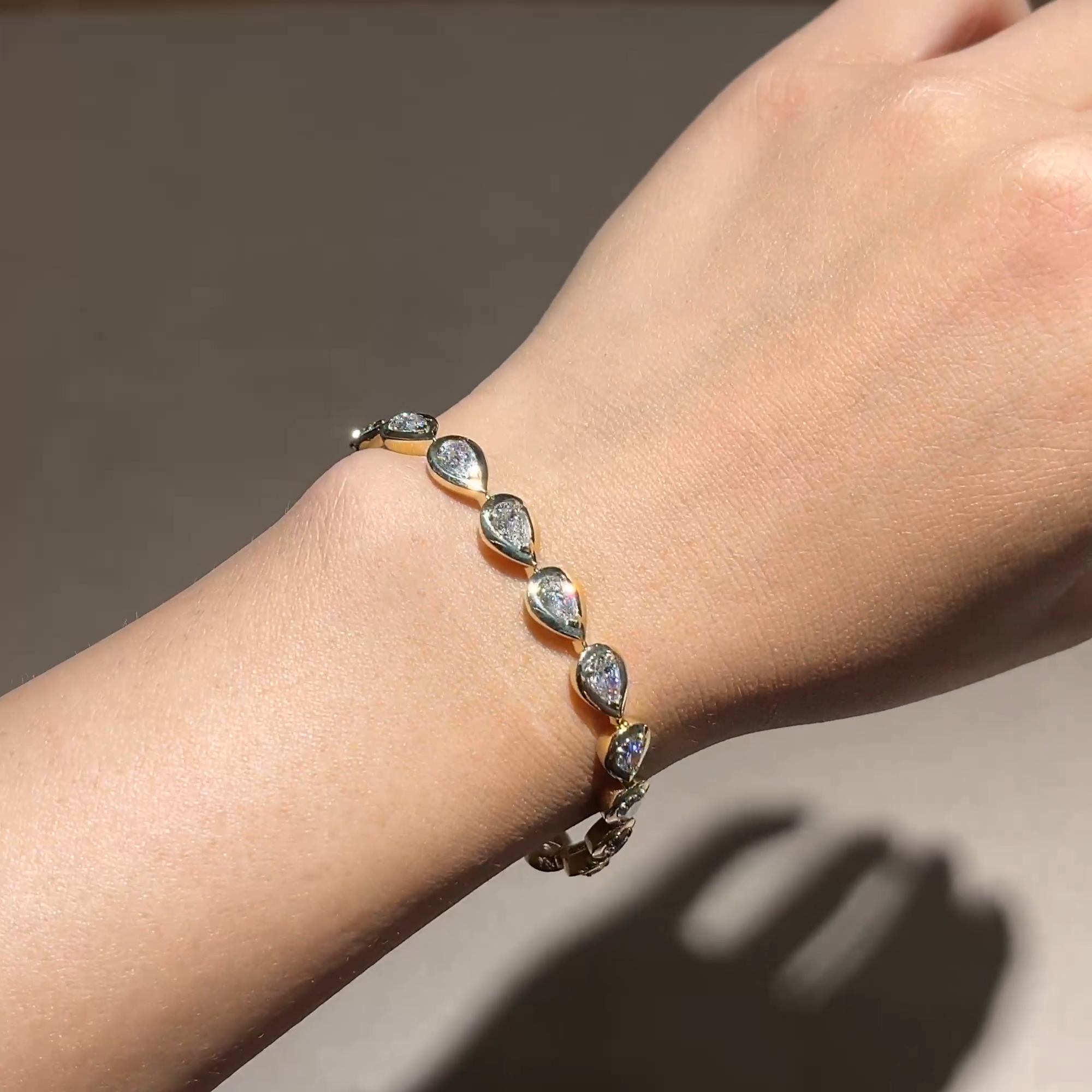 Skimming Stone Pear Shaped 5.70ct Diamond Line Bracelet in 18ct Yellow Gold