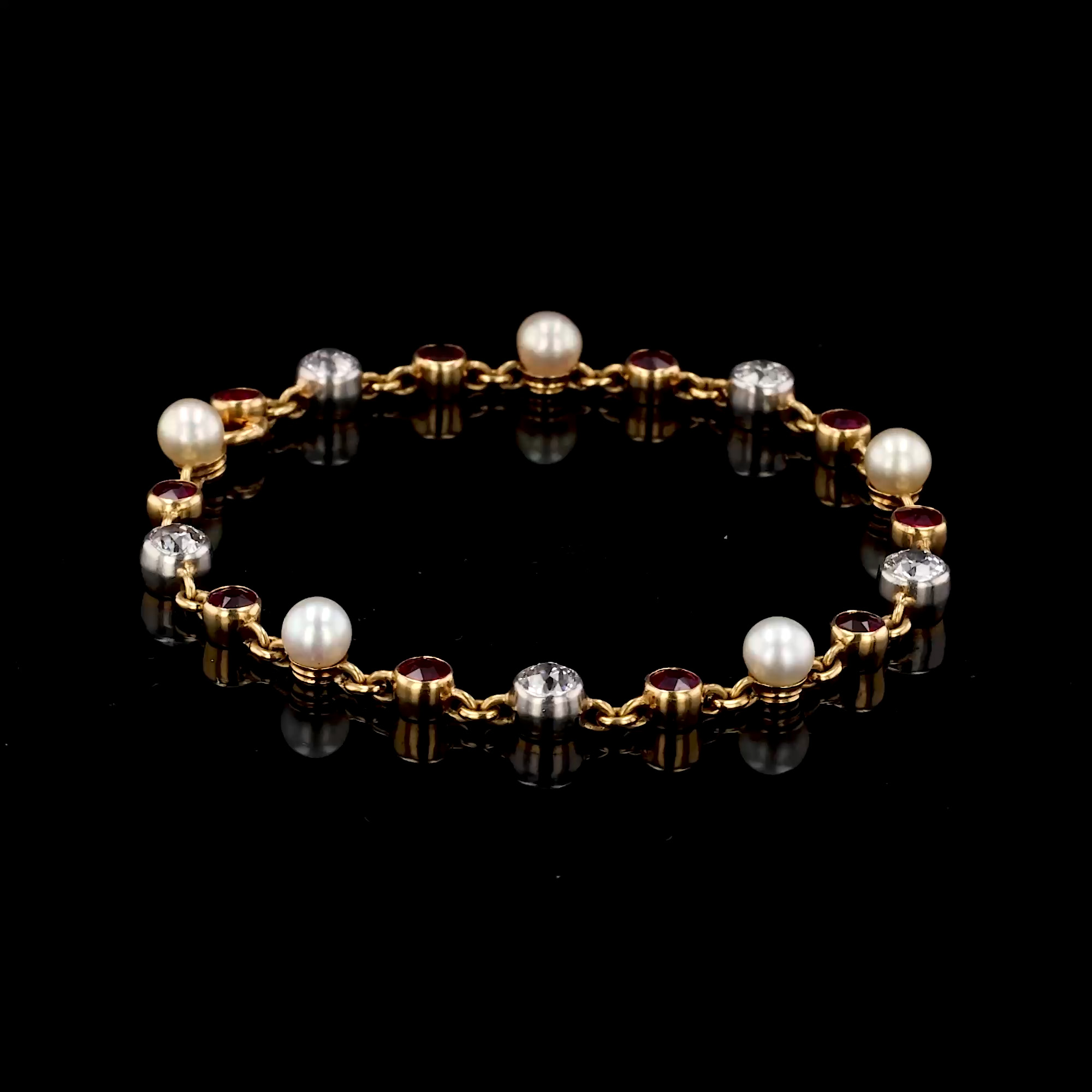 Belle Epoque Ruby, Diamond and Pearl Bracelet in 18ct Yellow Gold and Platinum
