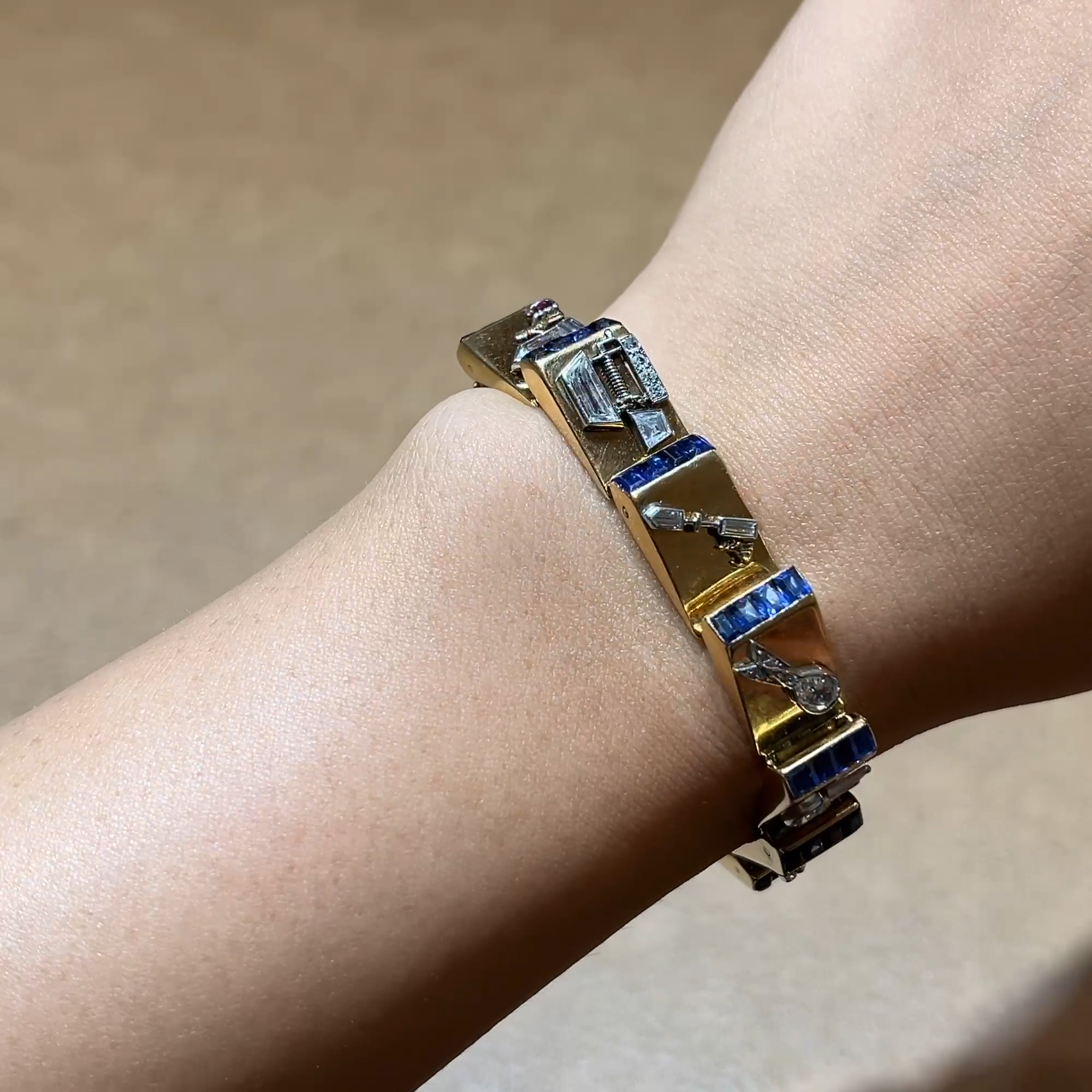 Calibre Cut Sapphire and Diamond Charm Bracelet In 18ct Yellow Gold