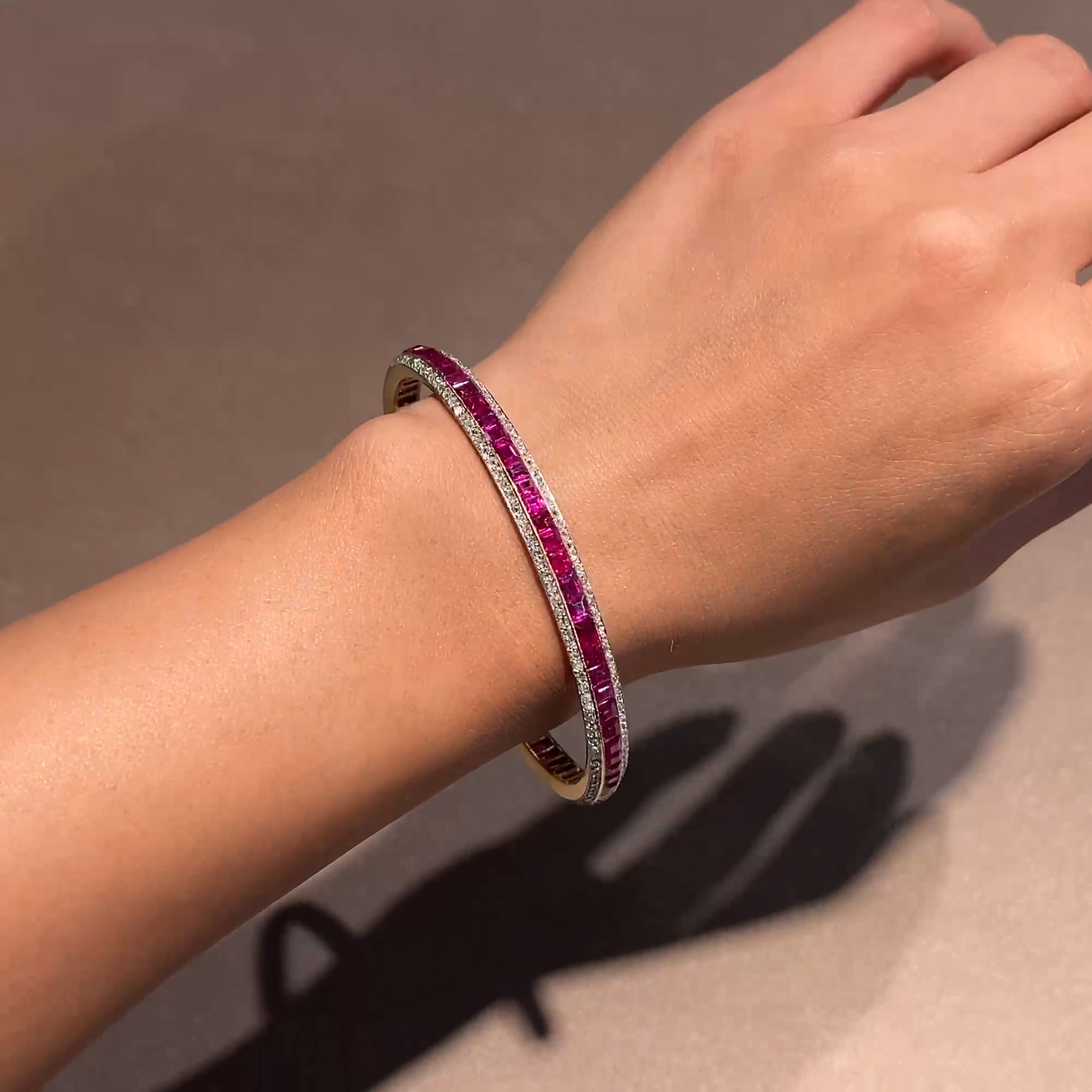 Victorian Calibre Cut Ruby and Diamond Bangle In Yellow Gold
