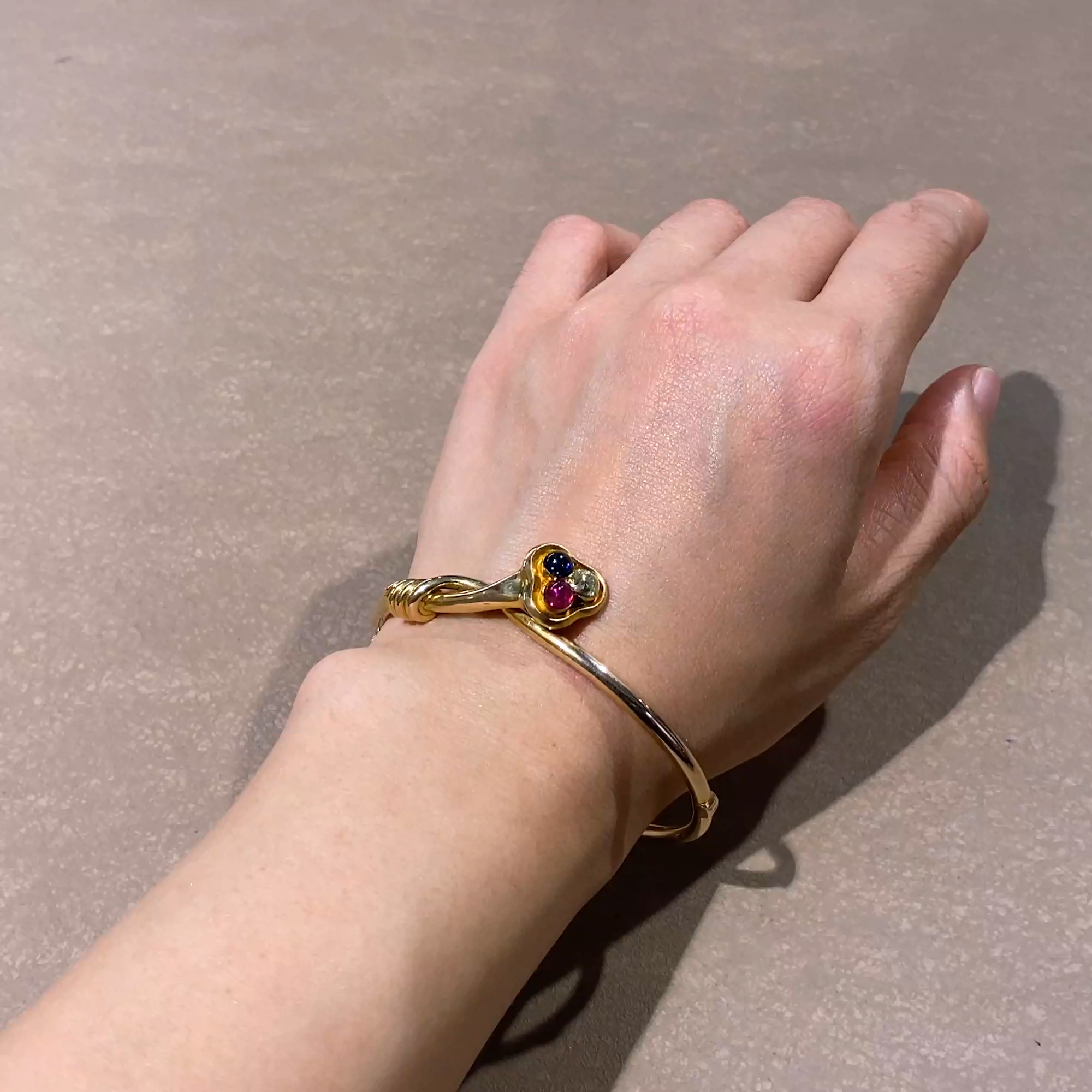 Edwardian ruby, sapphire & diamond hinged trefoil clover bangle in 14ct Yellow Gold