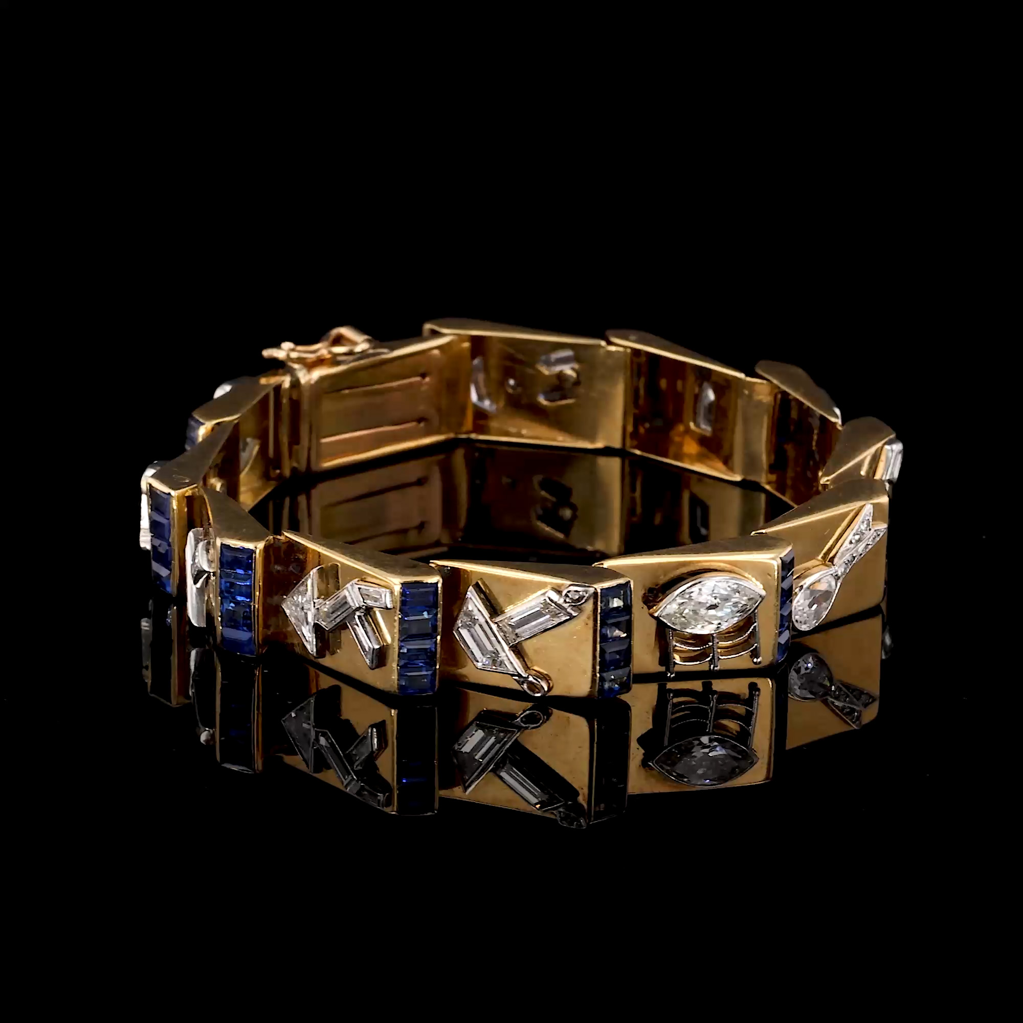 Art Deco Calibre Cut Sapphire and Diamond Charm Bracelet In 18ct Yellow Gold