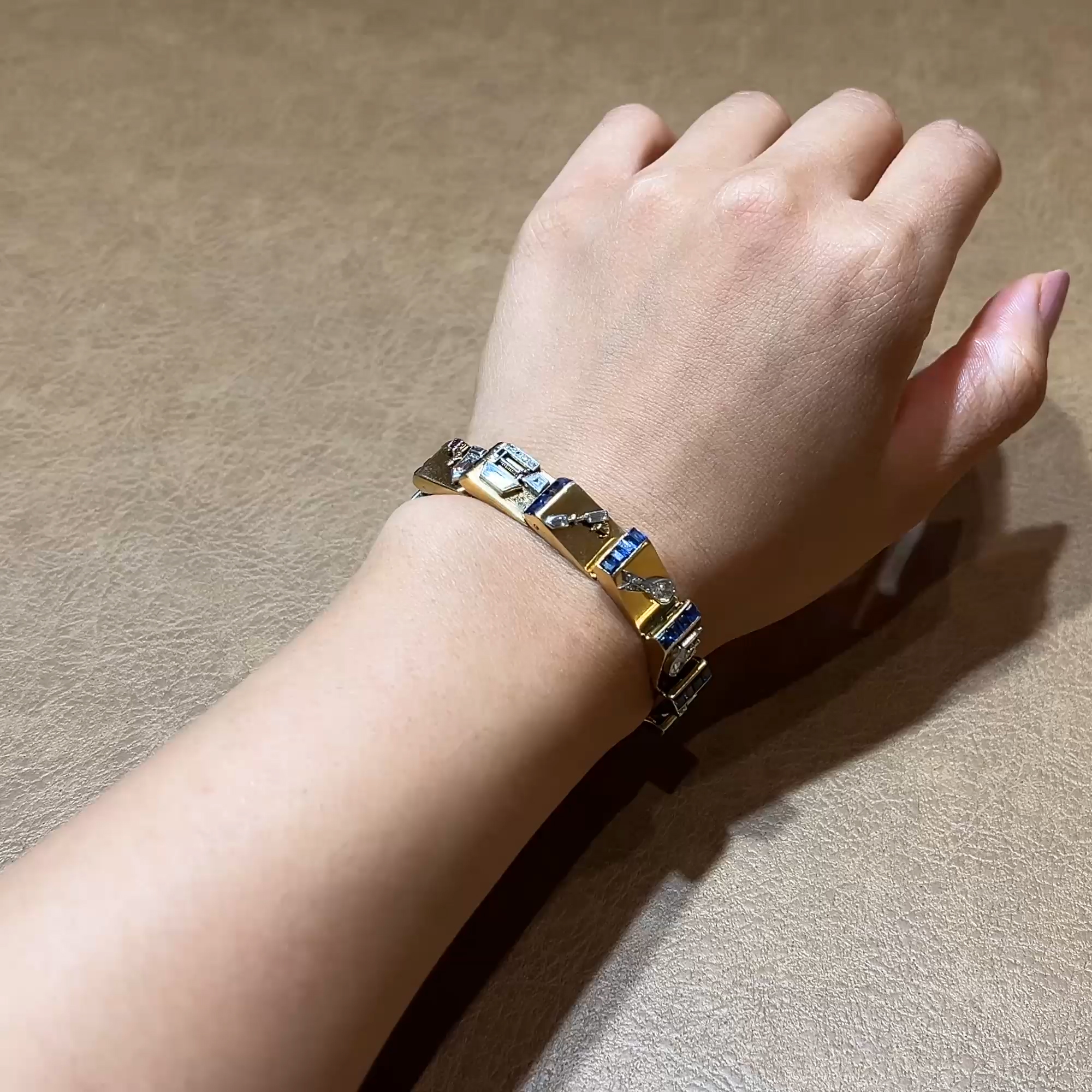 Art Deco Calibre Cut Sapphire and Diamond Charm Bracelet In 18ct Yellow Gold