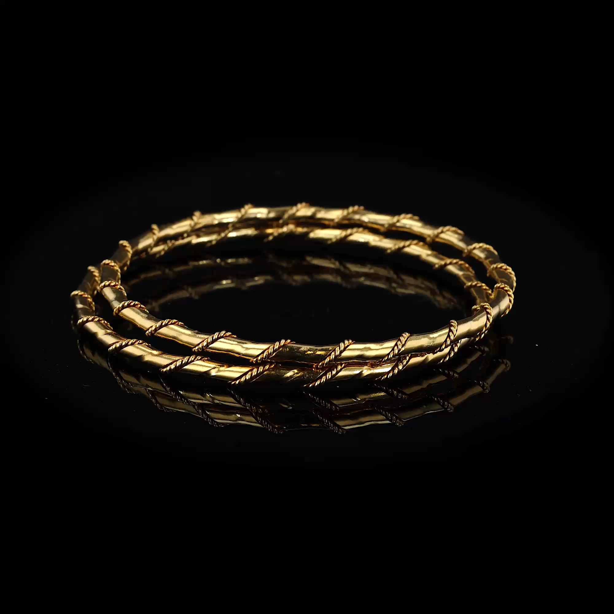 Cartier Gold Twist Design Bangles in 18ct Yellow Gold