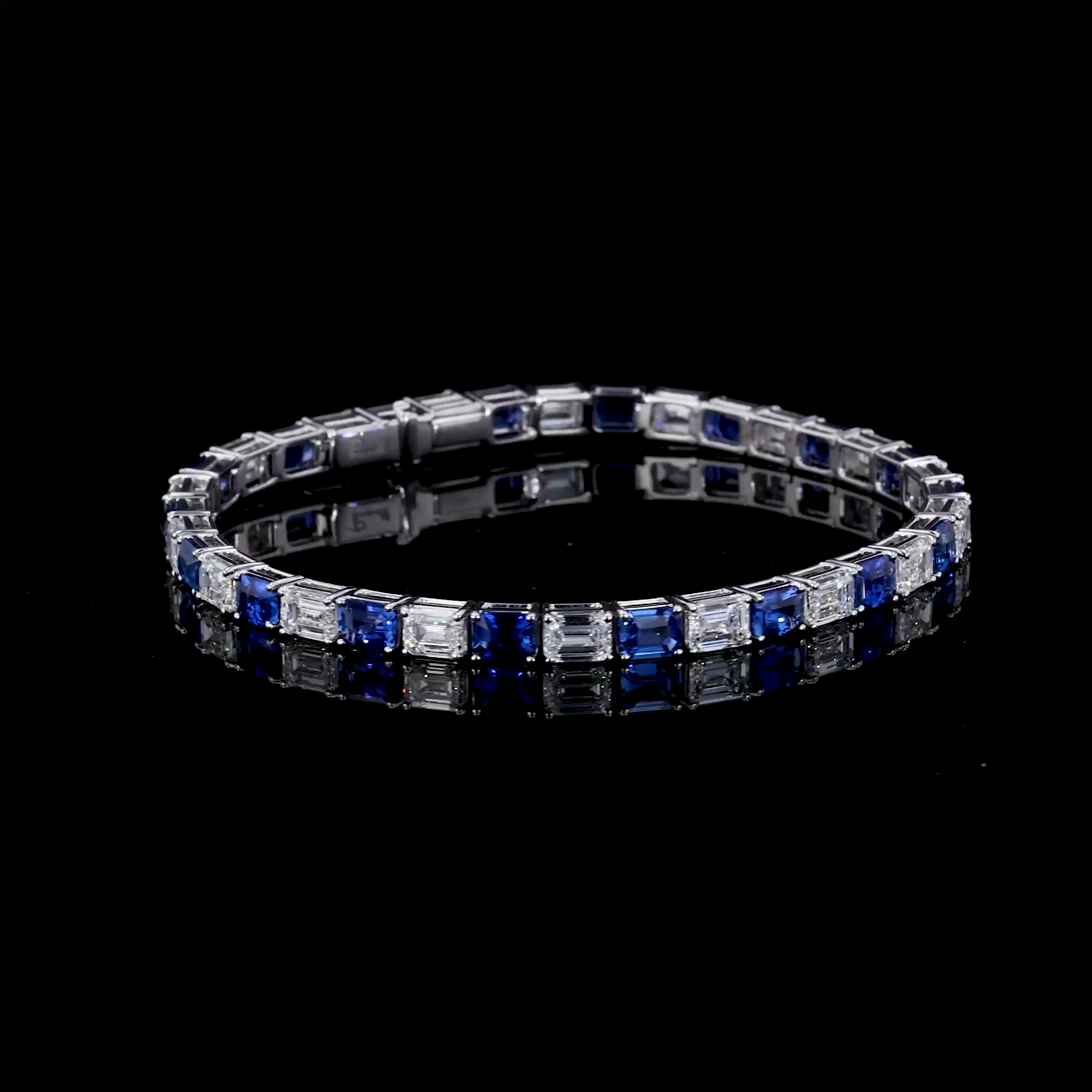 Emerald Cut 9.14ct Diamond and Sapphire Line Bracelet in 18ct White Gold