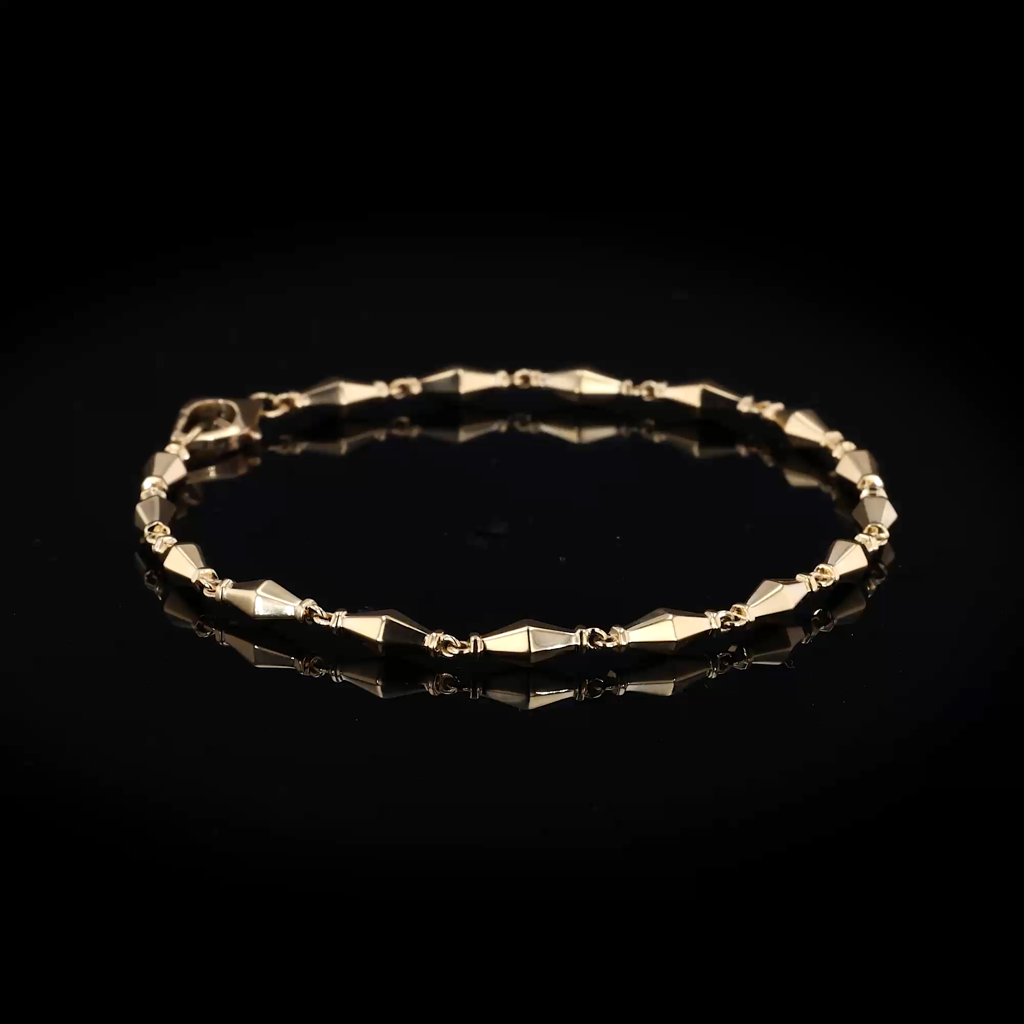 Cleopatra Gold Faceted Barrel Link Mini Bracelet in 18ct Yellow Gold