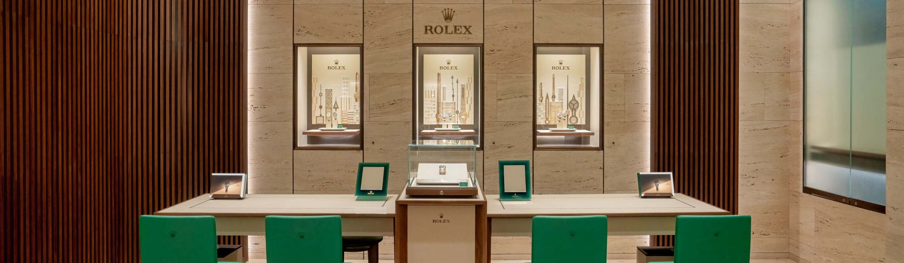Rolex retailer presenting a watch