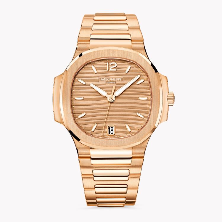 Patek Philippe Nautilus 35.2mm, Champagne Dial, Arabic/Baton Numerals_1