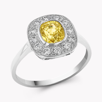 Oval Cut Yellow Sapphire and Diamond Cluster Ring in Platinum