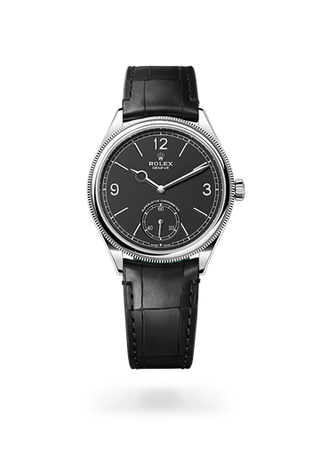 1908 * 39 mm, 18 ct white gold, polished finish with a Intense black Domed and fluted bezel and Leather strap bracelet
