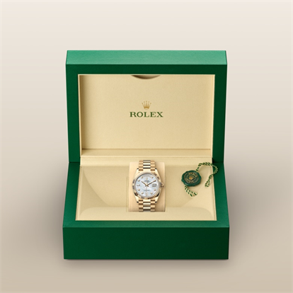 Day-Date 36, Oyster, 36 mm, yellow gold watch inside presentation box
