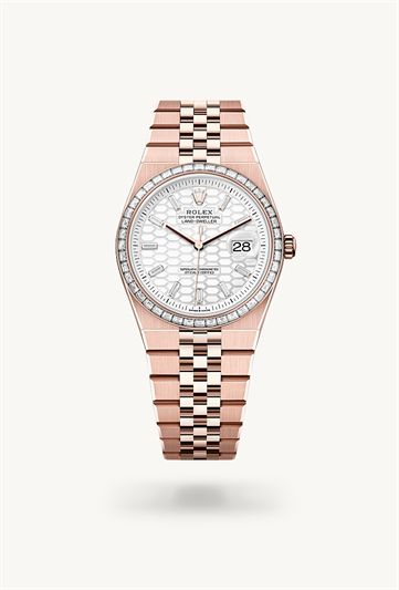 Land-Dweller 36 * Oyster, 36 mm, Everose gold and diamonds with a Intense white, honeycomb motif set with diamonds Set with diamonds bezel and Flat Jubilee, five-piece solid links bracelet
