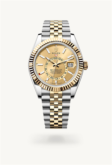 Sky-Dweller * Oyster, 42 mm, Oystersteel and yellow gold with a Champagne-colour Fluted, bidirectional rotatable Rolex Ring Command bezel and Oyster, three-piece solid links bracelet
