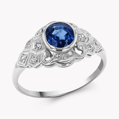 Oval Cut Sapphire and Diamond Cluster Ring