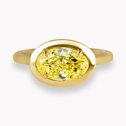 Skimming Stone 2.01ct Oval Cut Fancy Yellow Diamond Ring