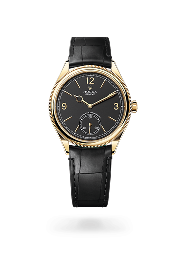 1908 * 39 mm, 18 ct yellow gold, polished finish with a Intense white Domed and fluted bezel and Leather strap bracelet