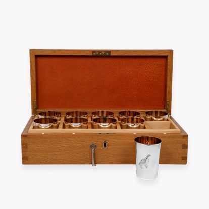 Silver Set of Ten Bird Motif Shooting Cup with Guilded Edge