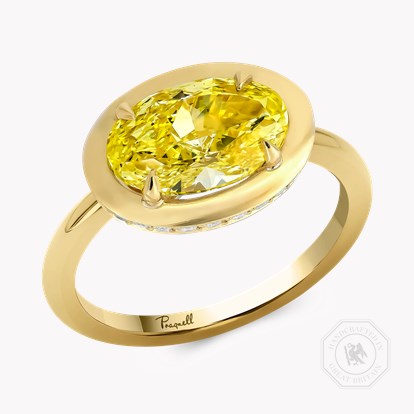 Skimming Stone 2.01ct Oval Cut Fancy Yellow Diamond Ring